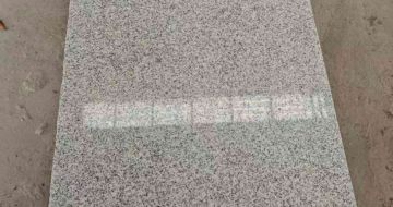 通化芝麻白光面毛板