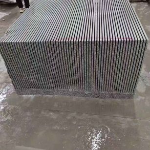 通化芝麻白毛板荒料切割